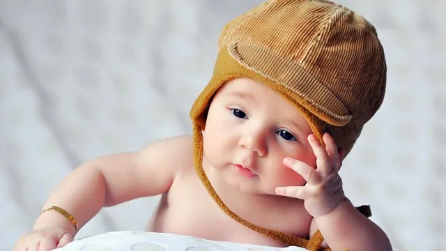 Baby In Corduroy Cap Cute Wallpaper