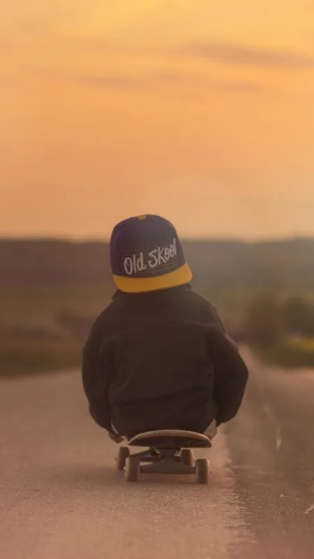 Kid Skateboarding At Sunset Cute Wallpaper