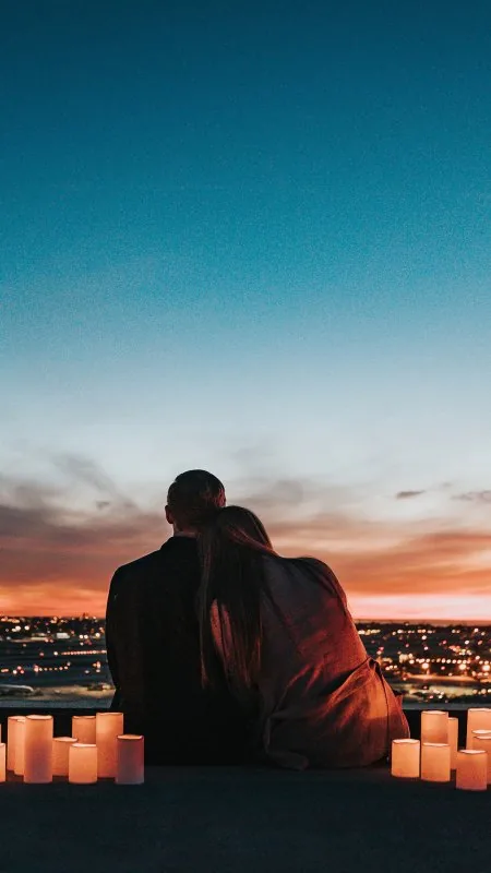Candlelit Rooftop Cuddle Love Wallpaper