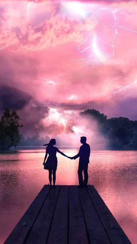 Couple On Pier Pink Storm Love Wallpaper