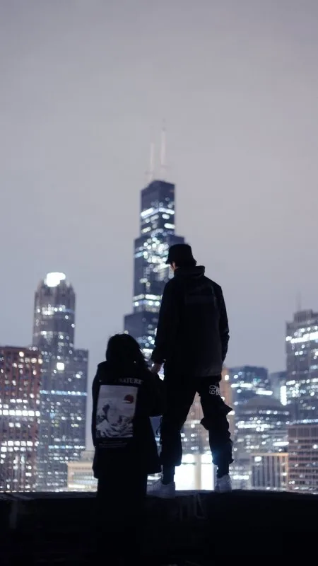 Couple Overlooking City Skyline Love Wallpaper