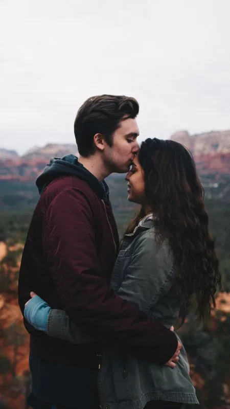 Forehead Kiss In Mountains Love Wallpaper