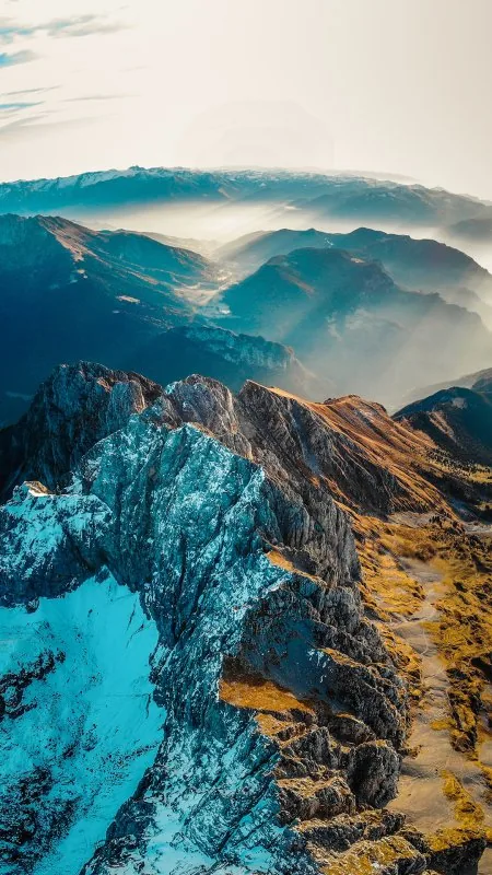 Sunlit Rocky Mountain Ridges Nature Wallpaper